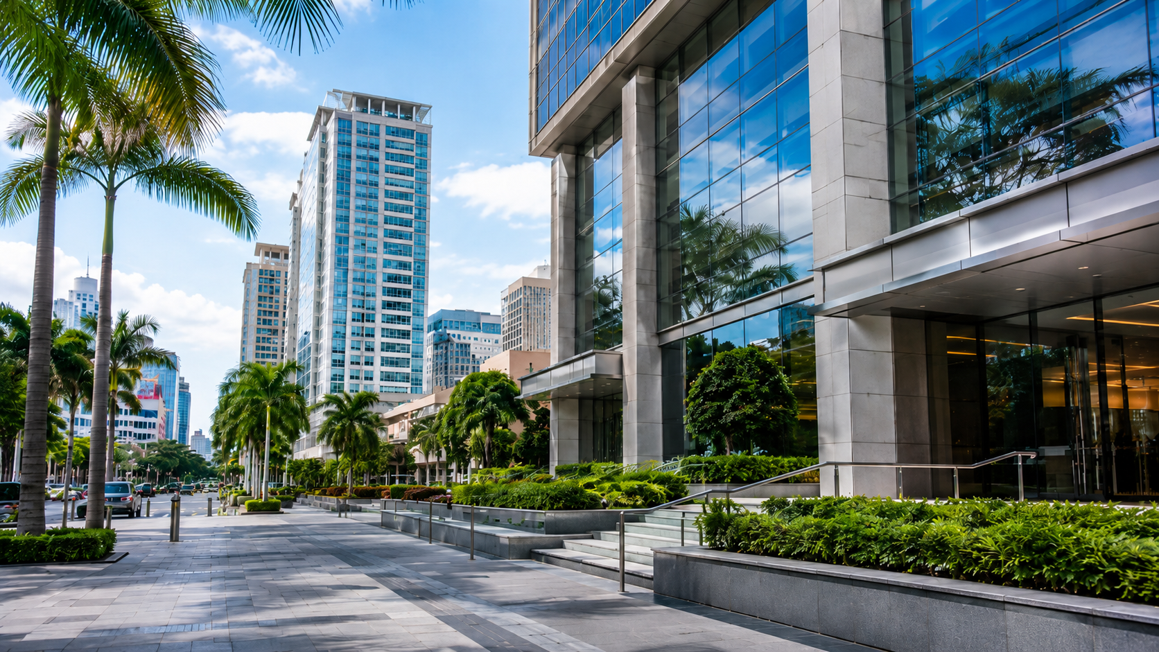 Corporate plaza in Puerto Rico with modern office towers and palm trees